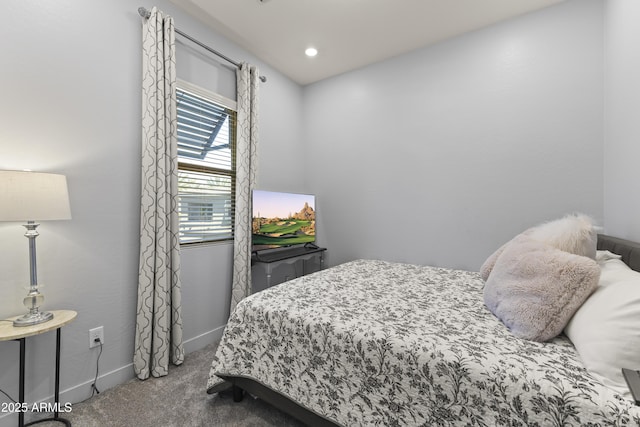 carpeted bedroom with baseboards
