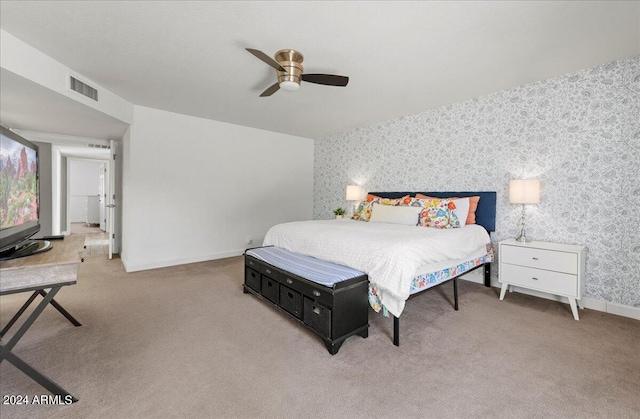 bedroom featuring ceiling fan and carpet flooring