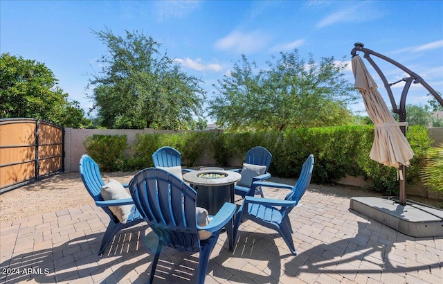 view of patio / terrace featuring a fire pit