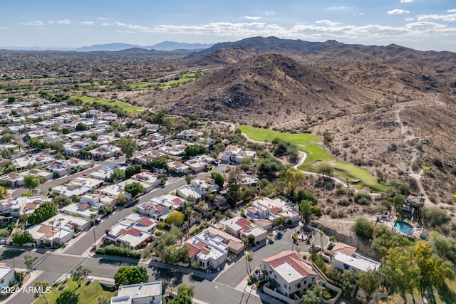 birds eye view of property featuring a mountain view