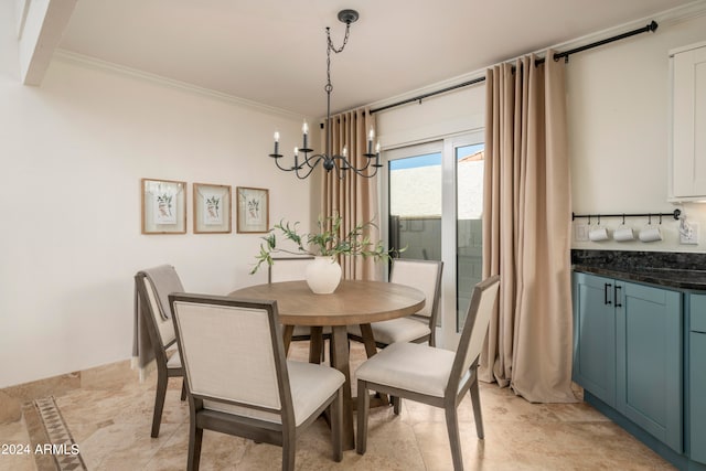 dining room with beamed ceiling, ornamental molding, and a notable chandelier