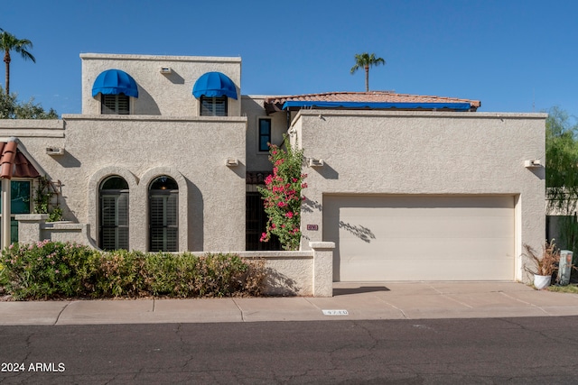 view of front of house with a garage