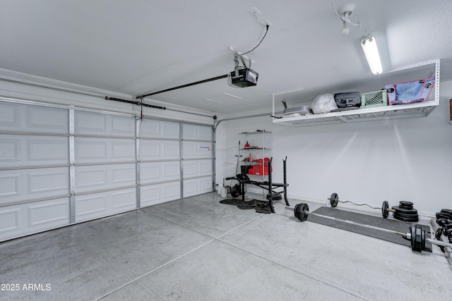 garage featuring a garage door opener