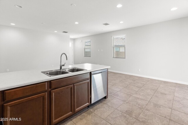 5957 N 89th Dr, Glendale, AZ 85305 - kitchen with a sink, stainless steel dishwasher, recessed lighting, light countertops, and light tile patterned floors