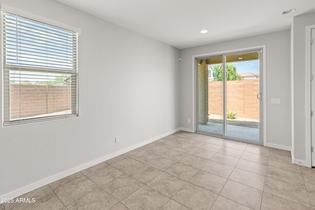 5957 N 89th Dr, Glendale, AZ 85305 - spare room with light tile patterned floors, baseboards, and recessed lighting