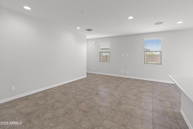 5957 N 89th Dr, Glendale, AZ 85305 - spare room with healthy amount of natural light, recessed lighting, baseboards, and tile patterned flooring