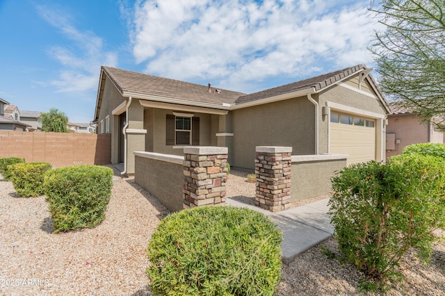 5957 N 89th Dr, Glendale, AZ 85305 - ranch-style house with an attached garage and stucco siding