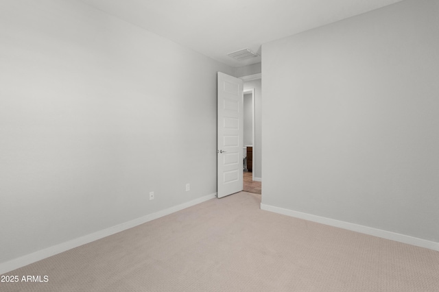 5957 N 89th Dr, Glendale, AZ 85305 - spare room featuring light carpet and baseboards