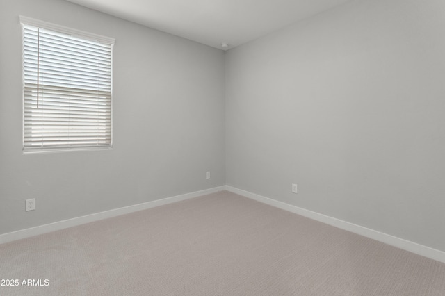 5957 N 89th Dr, Glendale, AZ 85305 - empty room with light colored carpet and baseboards