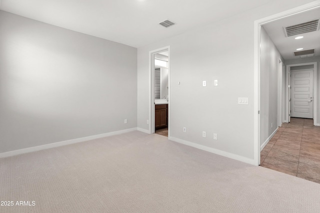 5957 N 89th Dr, Glendale, AZ 85305 - empty room with baseboards, light carpet, and recessed lighting