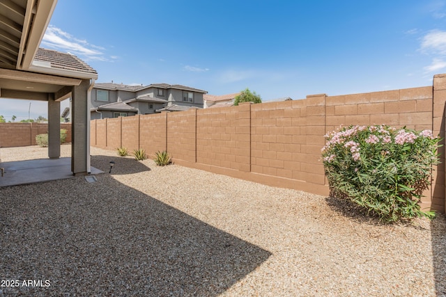 5957 N 89th Dr, Glendale, AZ 85305 - fenced backyard with a patio area