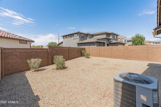 5957 N 89th Dr, Glendale, AZ 85305 - fenced backyard featuring central AC and a residential view