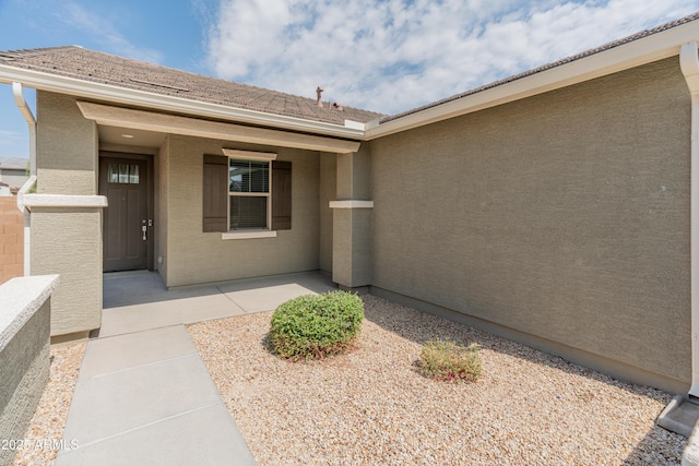 5957 N 89th Dr, Glendale, AZ 85305 - view of exterior entry featuring stucco siding