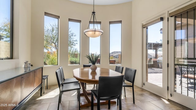 view of tiled dining space
