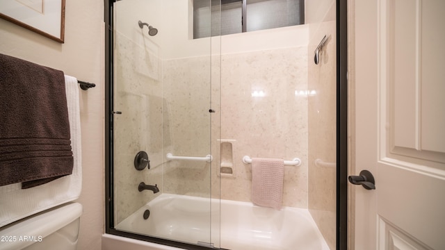 bathroom with toilet and enclosed tub / shower combo
