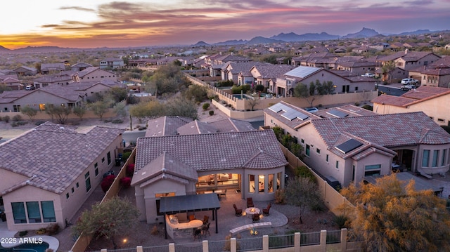 aerial view featuring a mountain view and a residential view