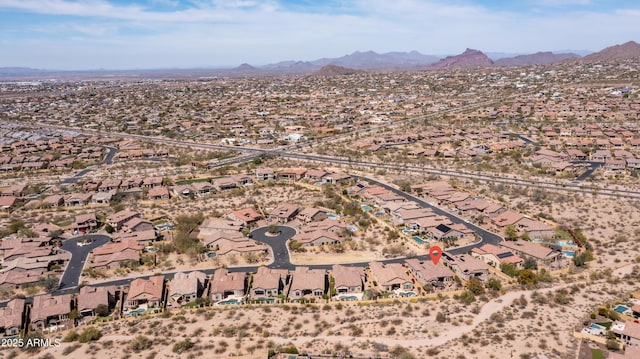 drone / aerial view featuring a mountain view and a residential view