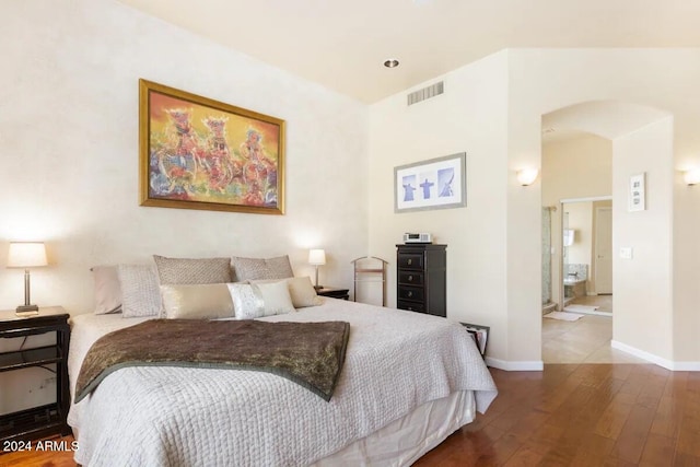 bedroom with wood-type flooring