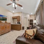 living room featuring ceiling fan