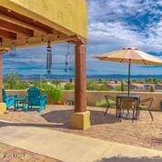 view of property's community featuring a patio