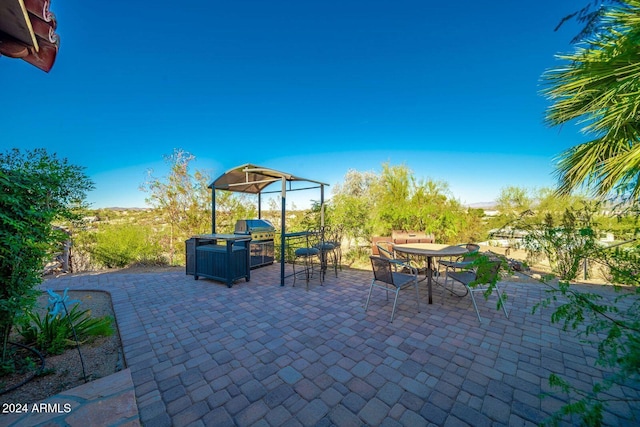 view of patio / terrace featuring a grill