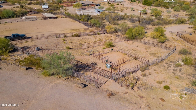 birds eye view of property featuring a rural view