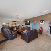 living room with an inviting chandelier