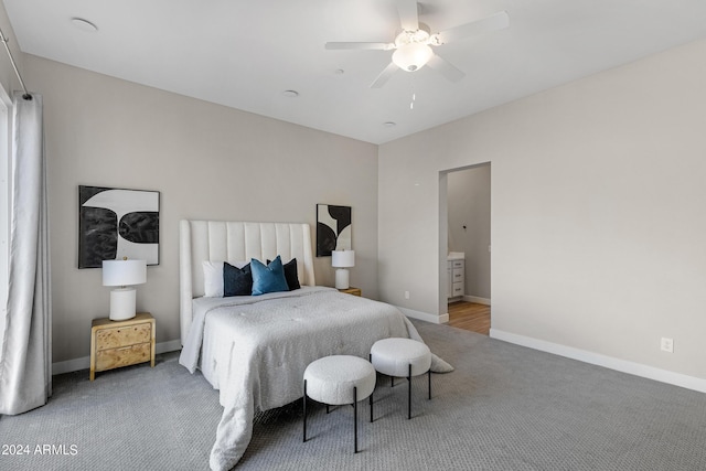 bedroom featuring ceiling fan, connected bathroom, and carpet