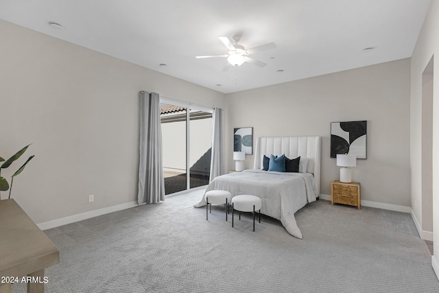 carpeted bedroom featuring ceiling fan and access to exterior