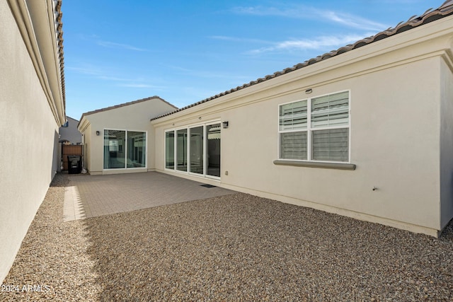 back of house featuring a patio