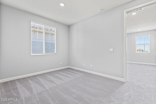 21047 N 58th Way, Phoenix, AZ 85054 - carpeted empty room featuring baseboards, recessed lighting, and a smoke detector