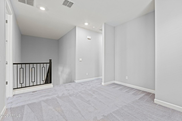 21047 N 58th Way, Phoenix, AZ 85054 - carpeted empty room featuring baseboards and recessed lighting
