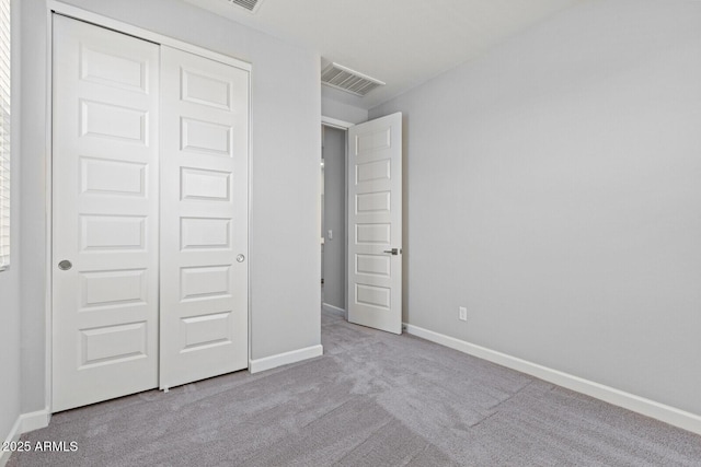 21047 N 58th Way, Phoenix, AZ 85054 - unfurnished bedroom with carpet floors, a closet, and baseboards