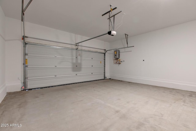 21047 N 58th Way, Phoenix, AZ 85054 - garage with a garage door opener, water heater, and baseboards