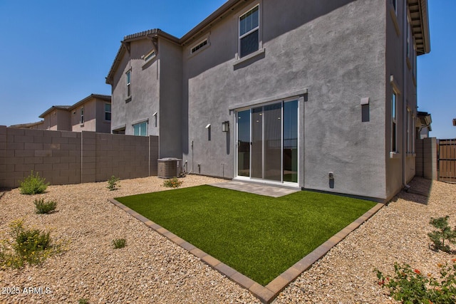 21047 N 58th Way, Phoenix, AZ 85054 - back of house featuring stucco siding, central AC, and a patio area