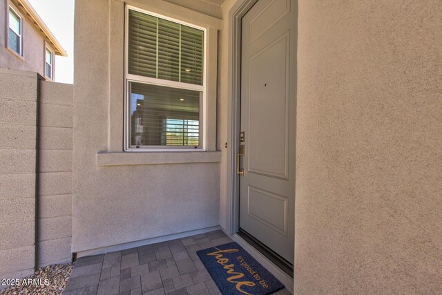 21047 N 58th Way, Phoenix, AZ 85054 - property entrance with stucco siding