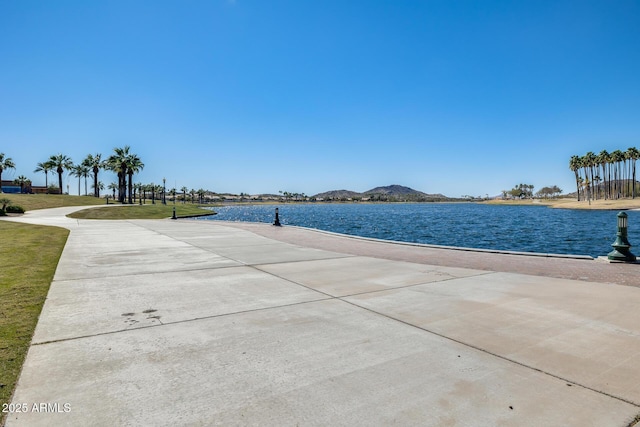 18103 W Canyon Ln, Goodyear, AZ 85338 - view of pool with a water and mountain view and a lawn