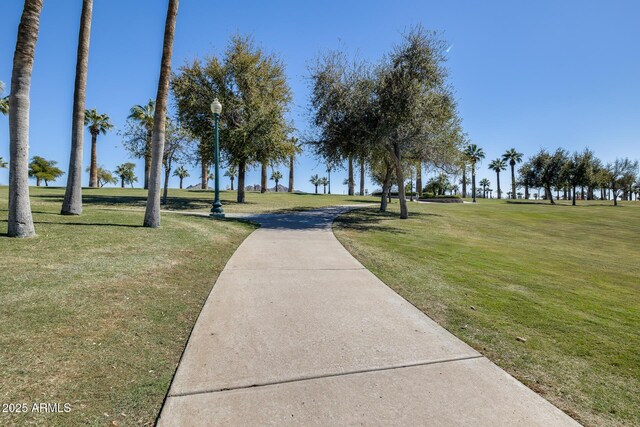 18103 W Canyon Ln, Goodyear, AZ 85338 - surrounding community featuring a lawn