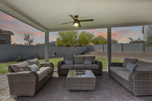 18103 W Canyon Ln, Goodyear, AZ 85338 - view of patio featuring a fenced backyard, a ceiling fan, and an outdoor hangout area
