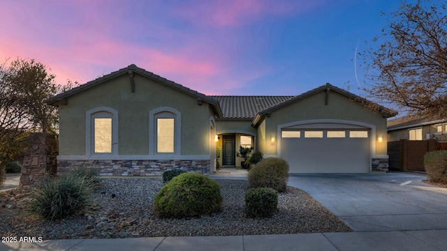 view of front of house with a garage