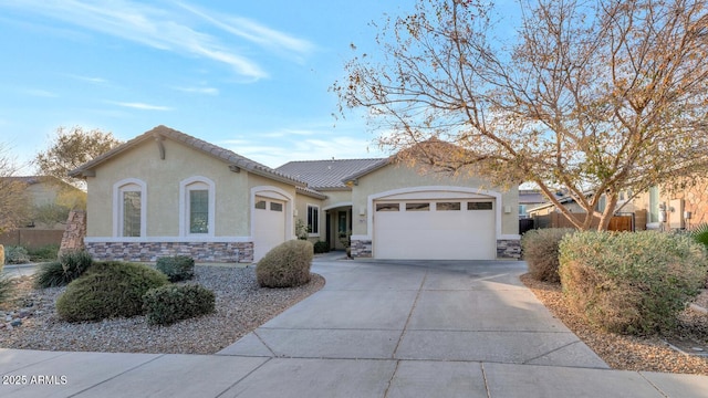 ranch-style house featuring a garage