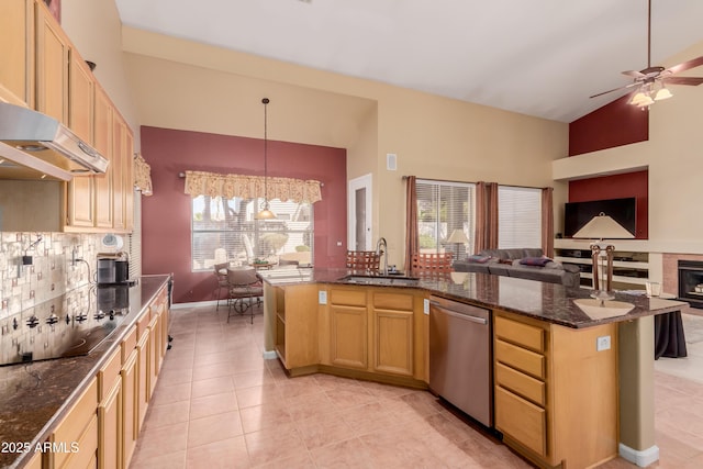 kitchen featuring a center island with sink, black electric cooktop, dishwasher, pendant lighting, and sink