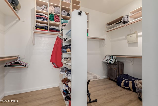 walk in closet featuring wood-type flooring