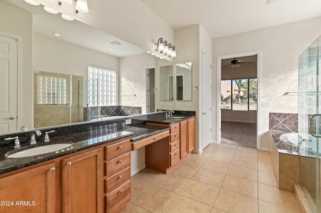 bathroom featuring a wealth of natural light, vanity, tile patterned floors, and ceiling fan