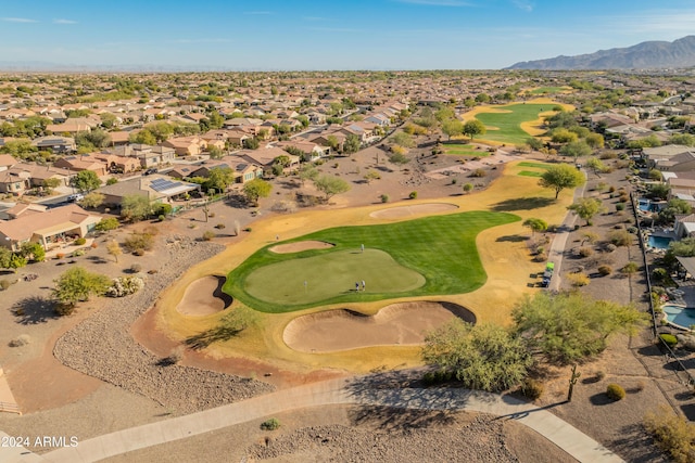 birds eye view of property featuring golf course view, a residential view, and a mountain view