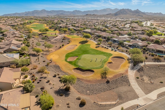 aerial view featuring a residential view, a mountain view, and golf course view