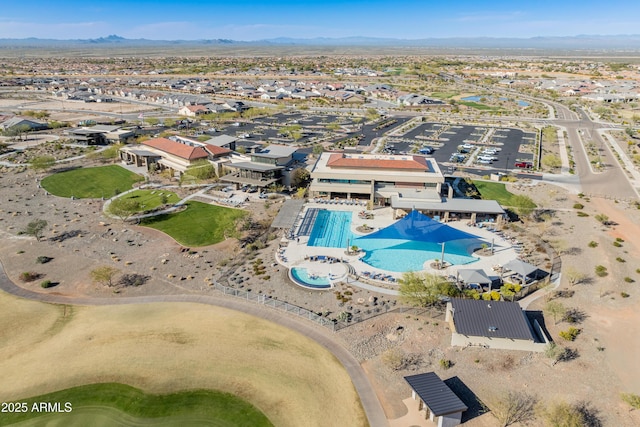 birds eye view of property featuring a mountain view