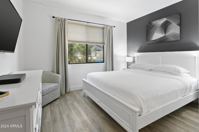 bedroom featuring light hardwood / wood-style flooring