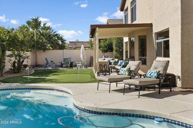 view of pool with a patio