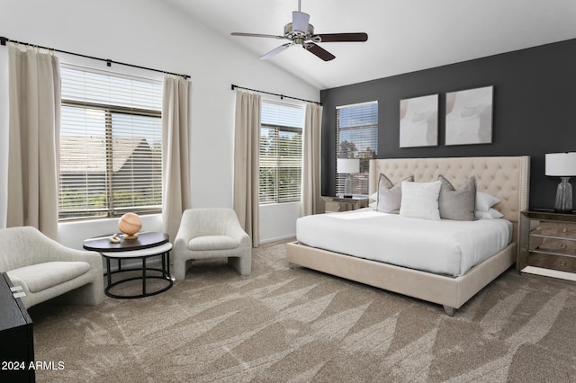 bedroom featuring carpet, multiple windows, ceiling fan, and vaulted ceiling